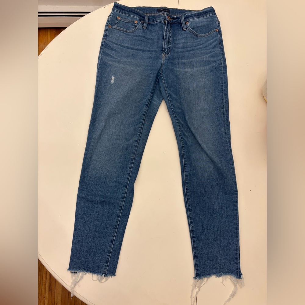 J.Crew 9” high-rise toothpick jean in medium indigo wash with cut hems